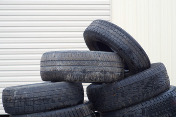 old worn out tires heap for recycling or scrap
