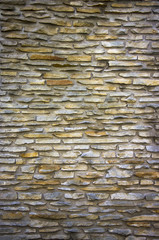 Fototapeta premium parti-coloured slate wall texture and background