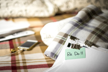 Re Do; Stack of Documents. Working or Studying at Bedroom.