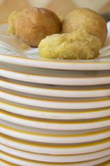 assortment of fry on a pile of dishes