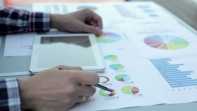 Businessman works with charts and diagrams are included