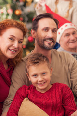 Friendly family celebrating Christmas at home