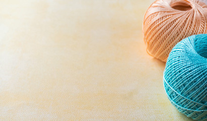 Colorful yarn balls with copy space for text. Selective focuse