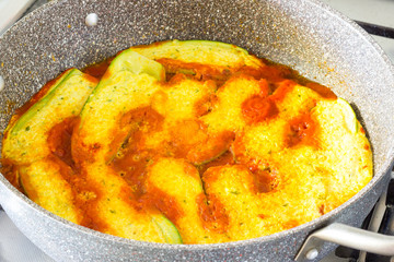 Cook stuffed zucchini