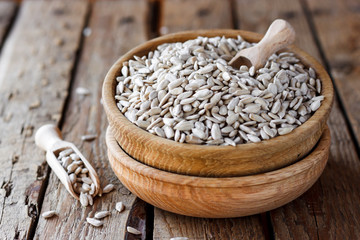 sunflower seeds in a wooden bowl