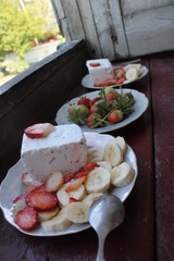 incredibly delicious summer dessert. strawberry sundae and a banana. ideal