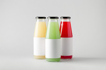 Juice Bottle Mock-Up - Three Bottles. Horizontal Label