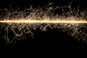 Black empty copy space new years eve linear sparks background.