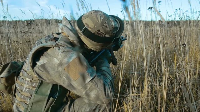 Ukrainian soldier takes aim