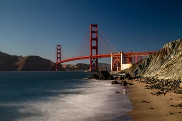 Fotobehang Blick von Marshalls Beach auf die Golden Gate Bridge im Abendlicht in San Francisco, Kalifornien, USA. © DirkR