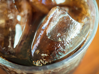 glass of cola with ice