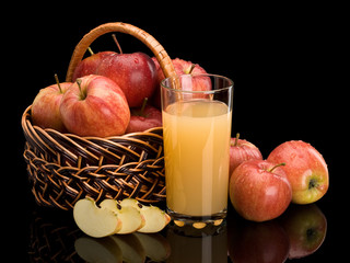 Ripe apples and juice with pulp
