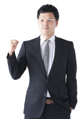 ガッツポーズのスーツ姿の男性