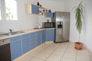 Modern kitchen interior with a blue decoration