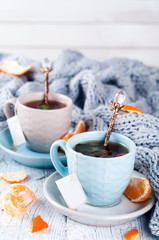 Traditional winter beverage tea with mint and tangerine.