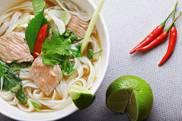 Pho bo soup above view closeup