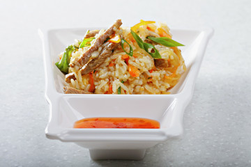 Vietnamese pilaf served with beef