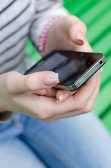 Young woman using her phone