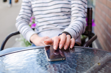 Young woman using her phone
