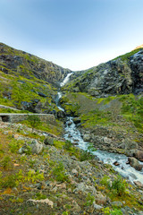Fototapeta na wymiar Waterfall in the mountains, Andalsnes, Norway
