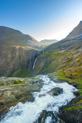 Naklejka na ściany i meble Waterfall in the mountains, canyon, Andalsnes, Norway
