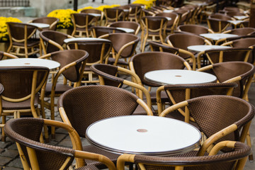 Empty tables of outdoor cafe in city center of Lviv, Ukraine in Europe