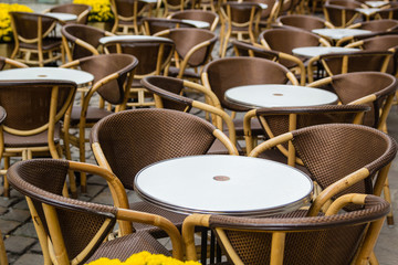 Empty tables of outdoor cafe in city center of Lviv, Ukraine in Europe