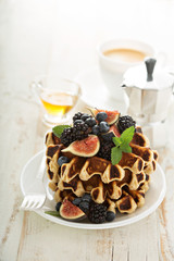 Fluffy breakfast waffles with fresh fruits