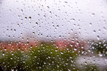Raindrops on glass closeup