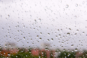 Raindrops on glass closeup