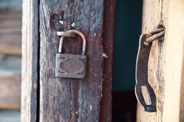 Hinged lock on the old shed
