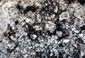 texture of coals on the grill