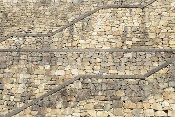 Stairs on stone wall
