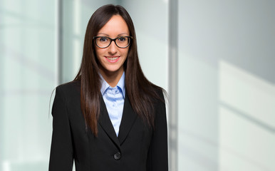 Young businesswoman in her office