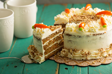 Slice of carrot cake with cream cheese frosting