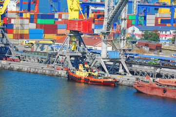 Tugboat and port cargo crane