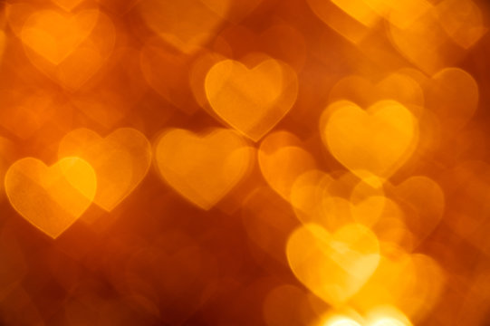 golden heart bokeh background photo, abstract holiday backdrop