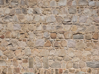 Mauer aus Sandstein als Hintergrund nutzbar