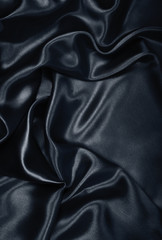 Fototapeta premium Smooth elegant black silk or satin as background
