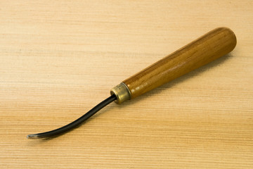 wood chisel for carving wood, sculpture tools on wooden backgrou