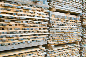 Stack of lumber wood in timber logs storage, A material for arch