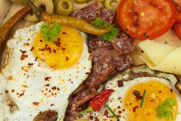 Fried Eggs on a plate. A hearty breakfast for athletes. Healthy food.
