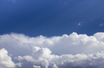 Naklejka na ściany i meble A split sky of blue and clouds