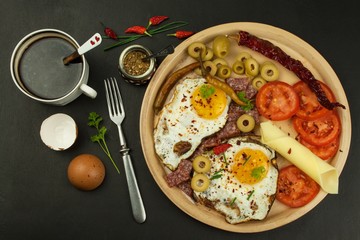 Fried Eggs on a plate. A hearty breakfast for athletes. Healthy food.
