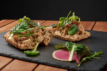 food background of Bread with duck meat and salad