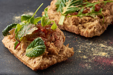 food background of Bread with duck meat and salad