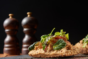 food background of Bread with duck meat and salad