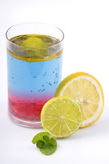 Colorful drink with fruit decoration.