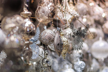 Colorful close up details of christmas fair market. Balls decora
