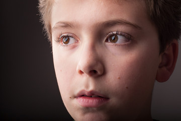 School Boy Close-up Portrait isolated on gray background